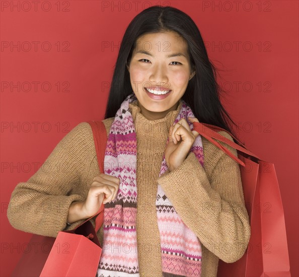 Young woman with shopping bags.