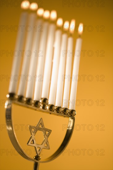 A fully lit menorah.