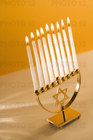 A fully lit menorah.