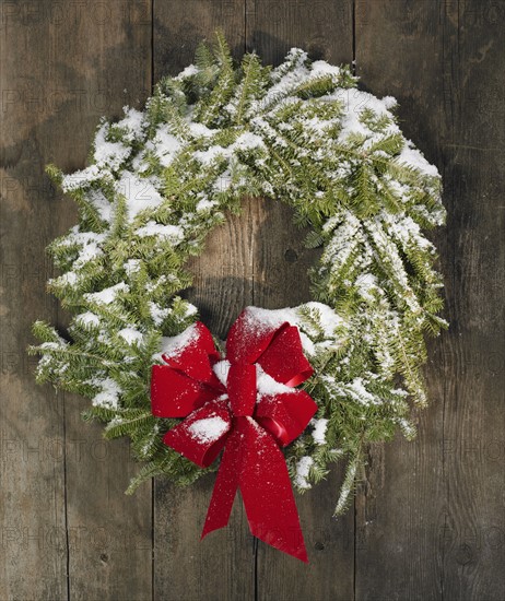 Christmas wreath hung on a wall.