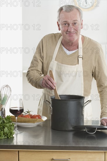 Portrait of man cooking.