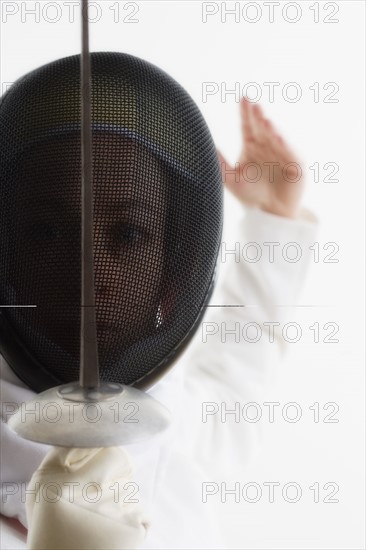 Closeup of a fencer.