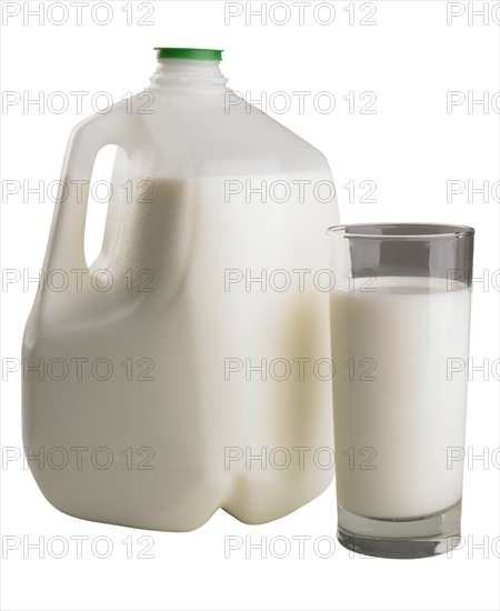 A gallon and glass of milk.