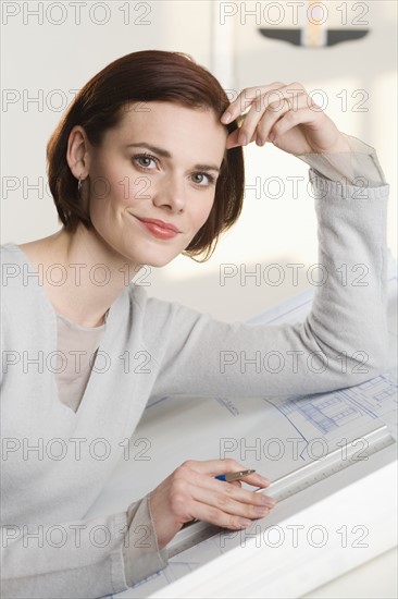 Portrait of woman at drawing board.