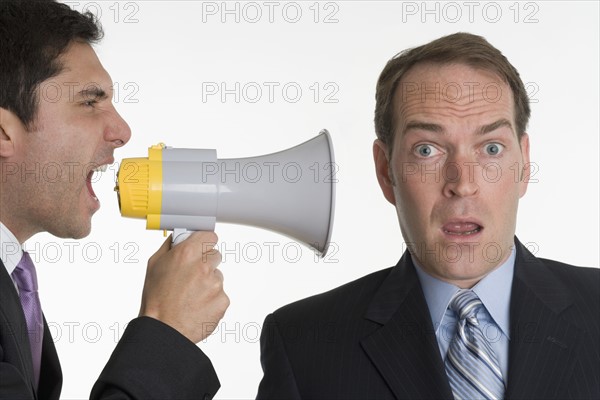 Two men with bullhorn.