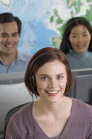 Phone operators using headsets.