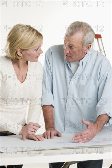 Couple working on their home.