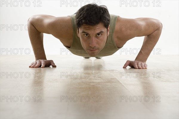 Man doing pushups.