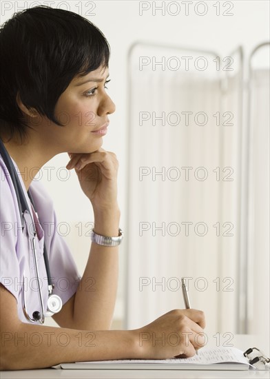 Profile view of a female health practitioner.