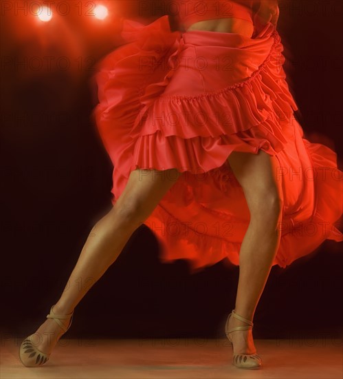 Woman dancing at nightclub.