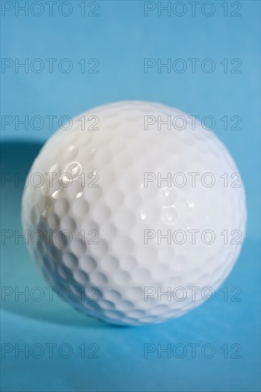 Closeup of a golf ball.