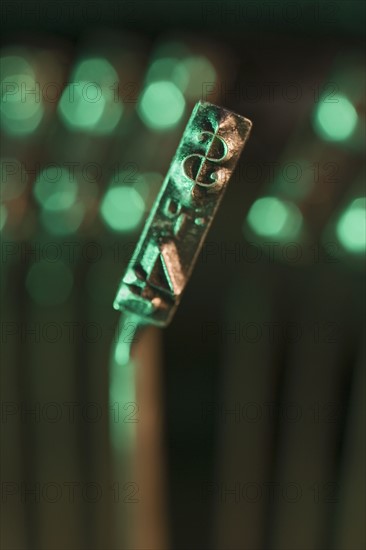 Closeup of typewriter printing plate.