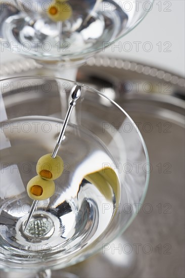 Closeup of two martini cocktails.