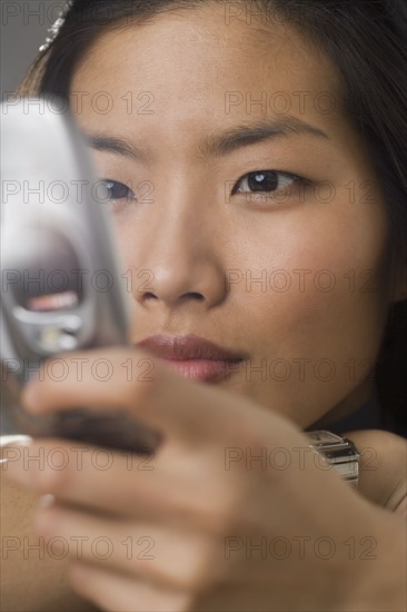 Young woman using a mobile phone.