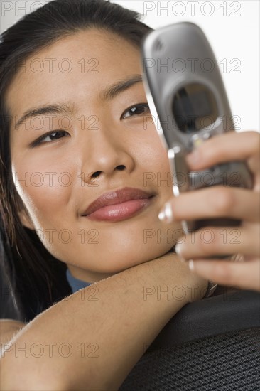 Young woman using a mobile phone.