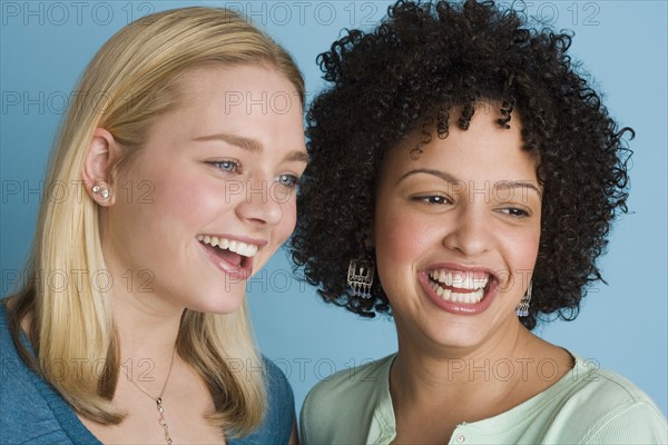 Closeup of two smiling women.