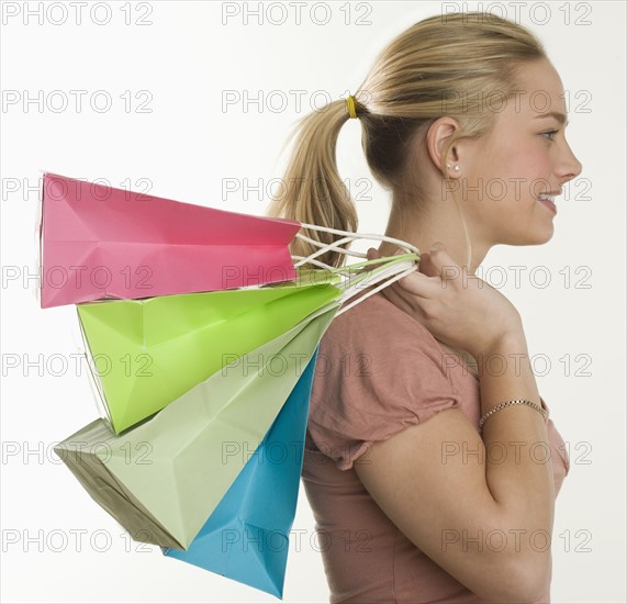 Woman with lots of shopping bags.