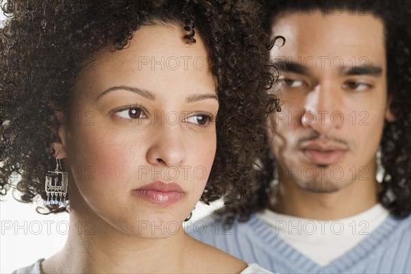Closeup of a serious couple.