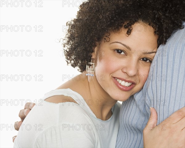 Portrait of a couple embracing.