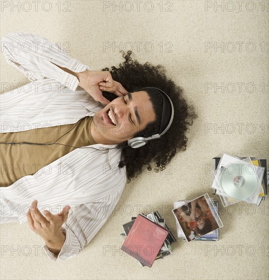 Young man listening to music.