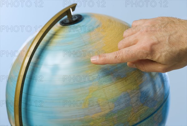 Hand spinning globe.