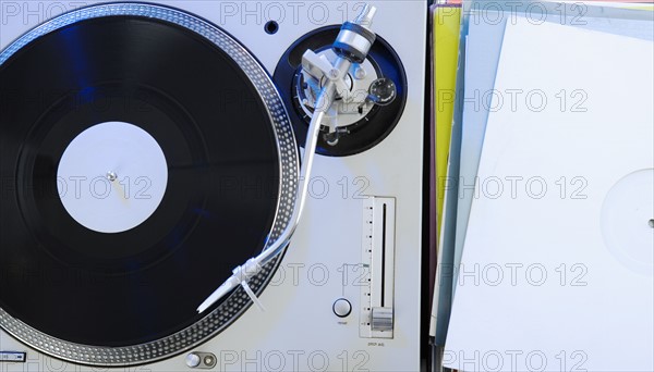 Still life of a turntable and record.