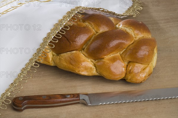 Closeup of a loaf of challah bread.