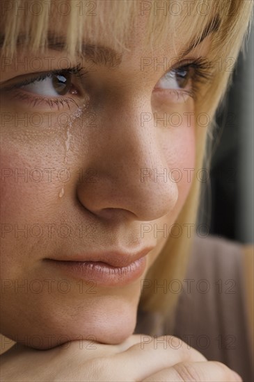 Close up of woman crying.