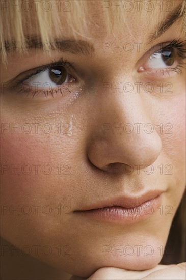 Close up of woman crying.