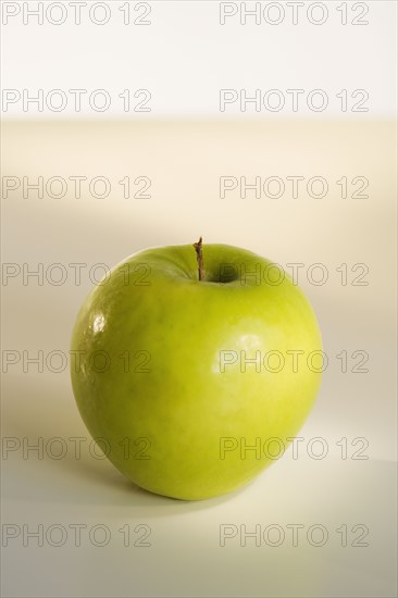 Close up of apple on table.