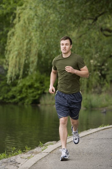 Man jogging in park.