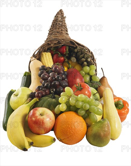 Studio shot of cornucopia with fruit.