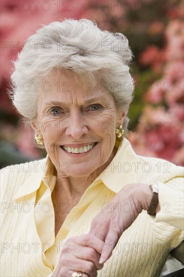 Portrait of senior woman outdoors.