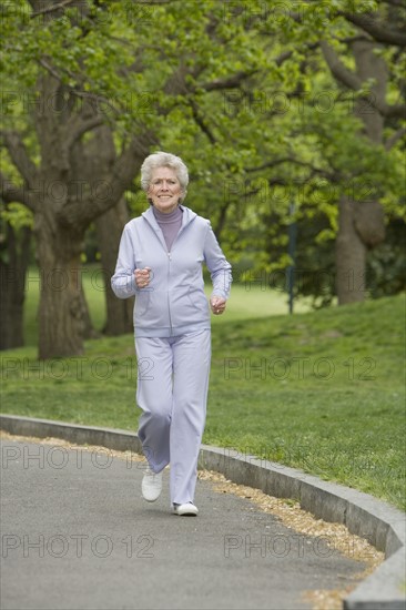 Senior woman power walking.