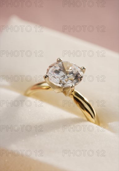 Closeup of a diamond engagement ring.