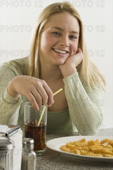 Portrait of woman in a diner.