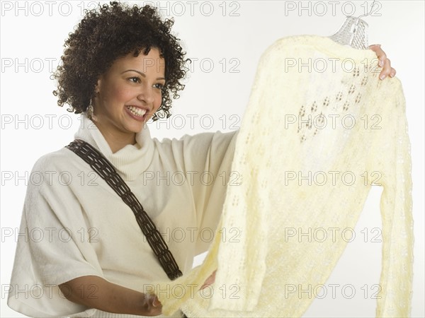 Woman shopping for clothes.