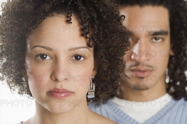 Closeup of a serious couple.