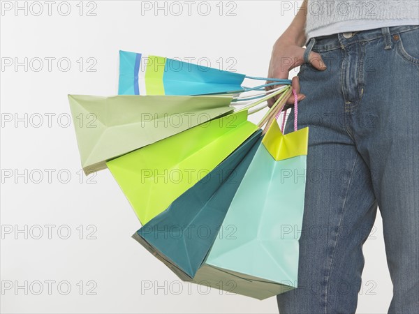 Woman holding shopping bags.