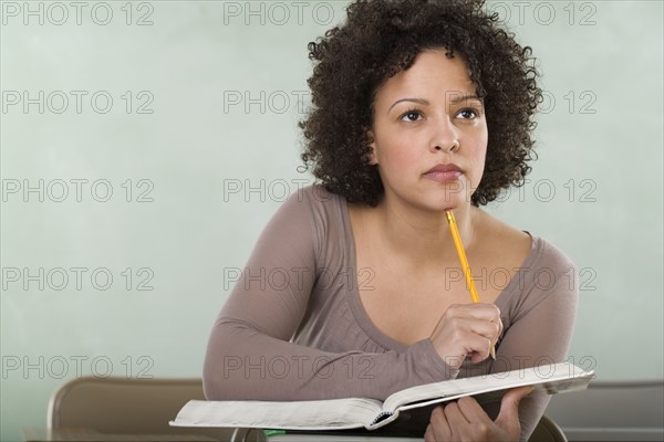 Female college student in class.