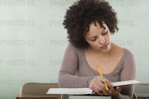 Female college student in class.