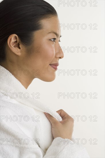 Portrait of woman in terrycloth robe.