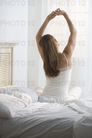 Woman waking up in the morning.