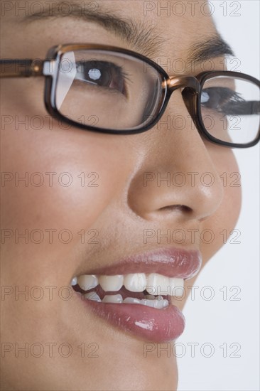 Headshot of woman wearing glasses.