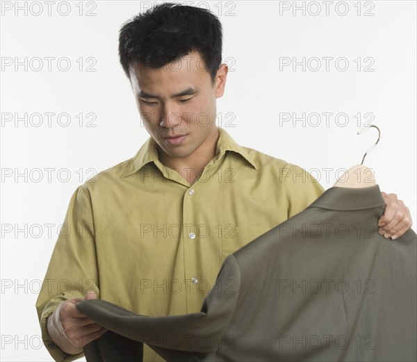 Man shopping for a sport coat.