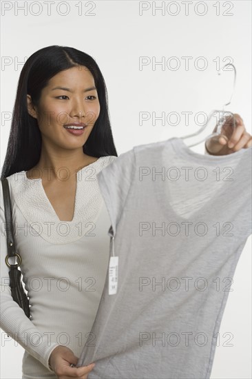 Woman shopping for dress.