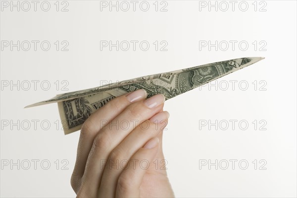 Paper airplane made of money.