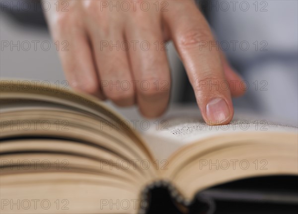 Man reading a book.