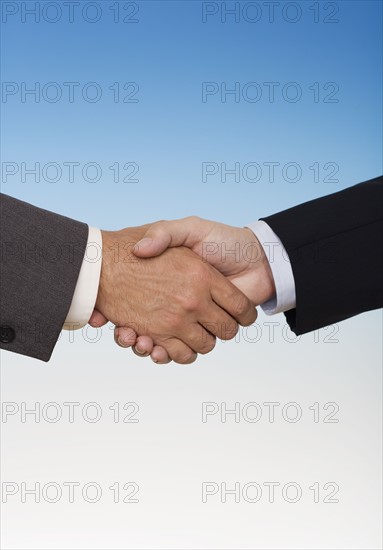 Businessmen shaking hands.