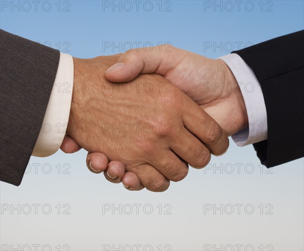 Businessmen shaking hands.